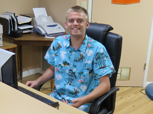 Cole working at the front desk