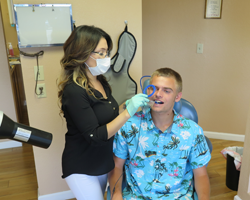 Cindy positions the digital x-ray film