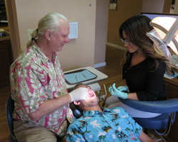 Dr. Keys continues the dental exam looking at each tooth